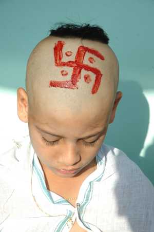 tonsure Swastik_on_head
