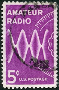 UNITED STATES OF AMERICA - CIRCA 1964: A stamp printed in USA shows Radio Waves and Dial, dedicated to the 100th anniversary of the Amateur Radio, circa 1964