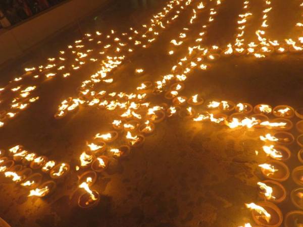 swastik, om lamps, kotipali shivratri